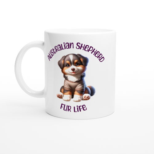 White ceramic mug with cute Australian Shepherd puppy wearing a t-shirt