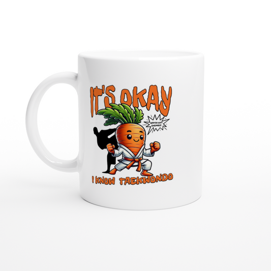 White ceramic mug with a graphic of a carrot doing Taekwondo and words It's Okay I Know Taekwondo