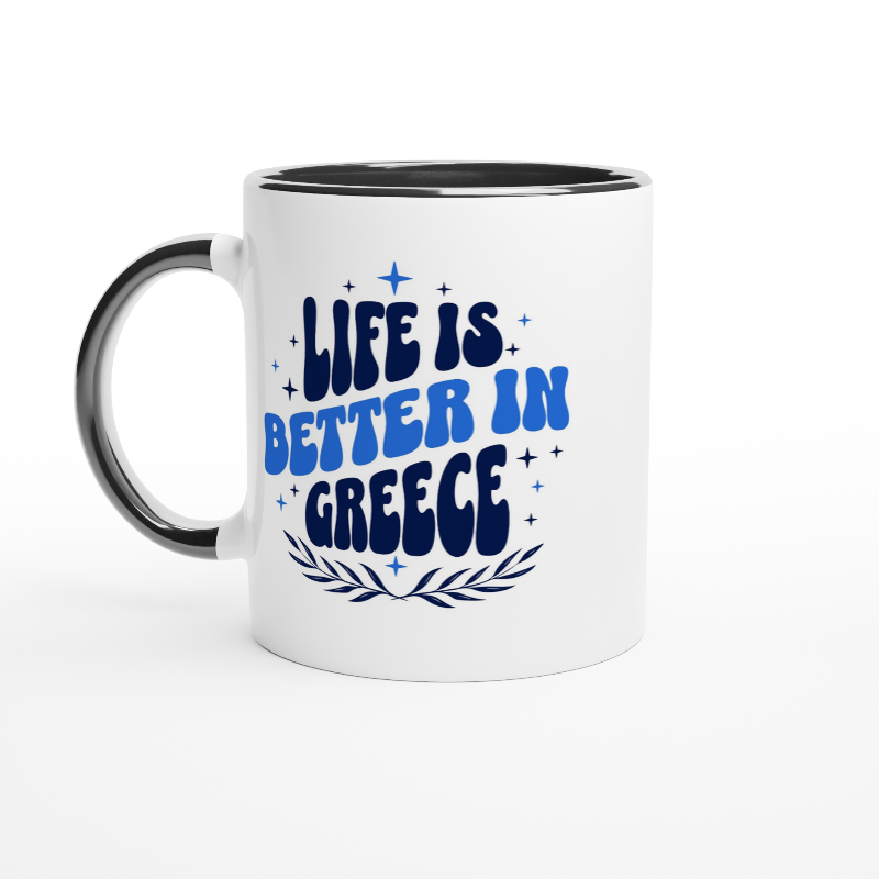 White mug with black inside and handle and blue writing with life is better in Greece stars decoration and olive wreath