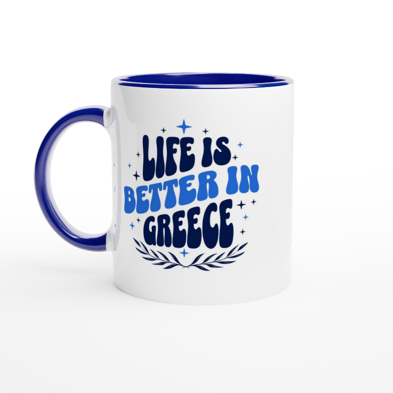 White mug with blue inside and handle and blue writing with life is better in Greece stars decoration and olive wreath