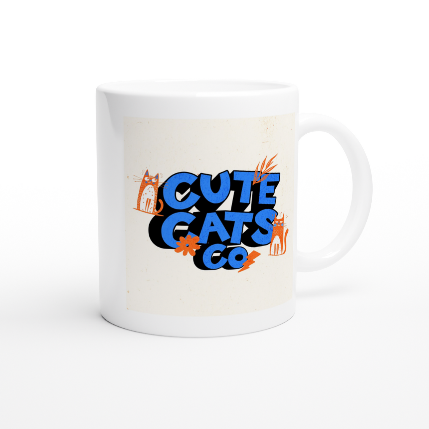 White ceramic mug with cute cats co lettering in blue and orange