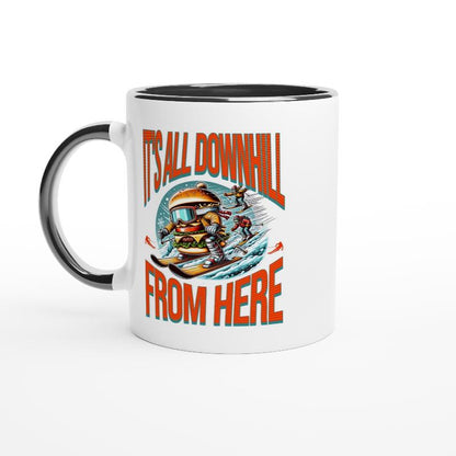 White ceramic mug with black handle and inside with a skiing burger and bold orange text It's All Downhill From Here