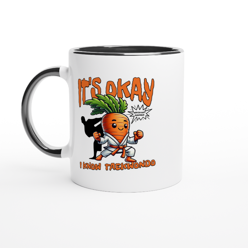 White ceramic mug with black inside and handle with a graphic of a carrot doing Taekwondo and words It's Okay I Know Taekwondo
